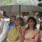 Dr shama mohd trolled by right wingers for holding an umbrella for Supriya Shrinate